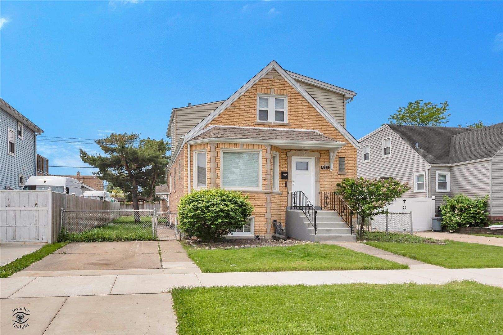 7229 57th Place Summit, IL 60501 - Photo 2 of 30 a front view of a house with a yard