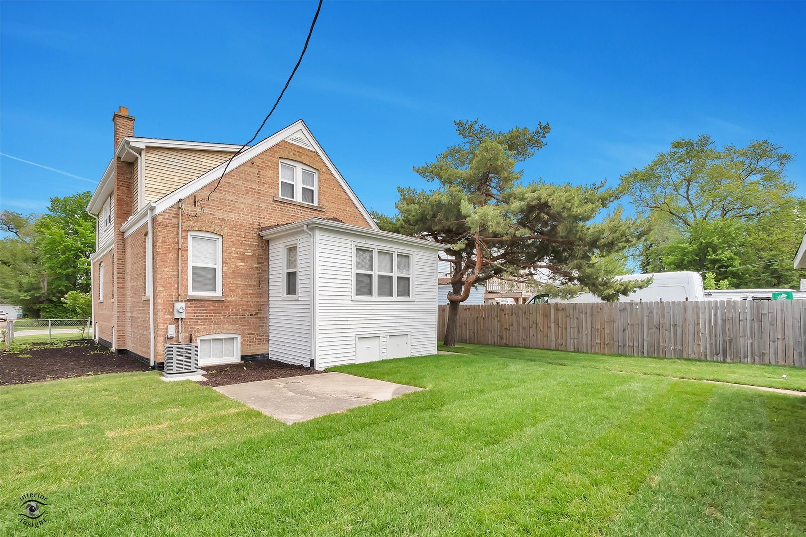7229 57th Place Summit, IL 60501 - Photo 4 of 30 a front view of a house with a yard and trees