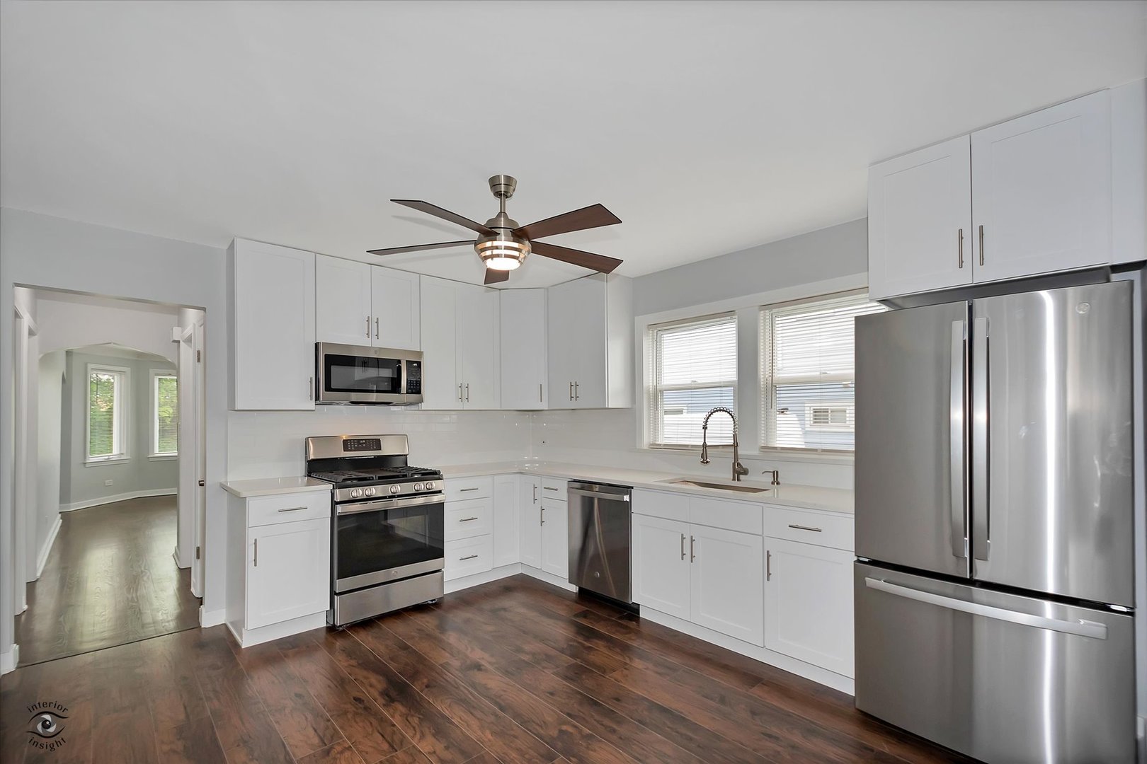 7229 57th Place Summit, IL 60501 - Photo 10 of 30 a kitchen with stainless steel appliances a refrigerator sink and stove