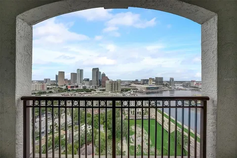 a view of a city skyline from a balcony