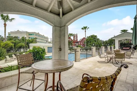 a view of a building with car parked