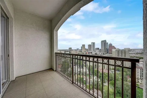 a view of a balcony with city view