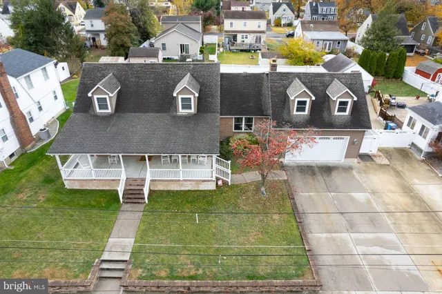 swimming pool view with a outdoor seating space