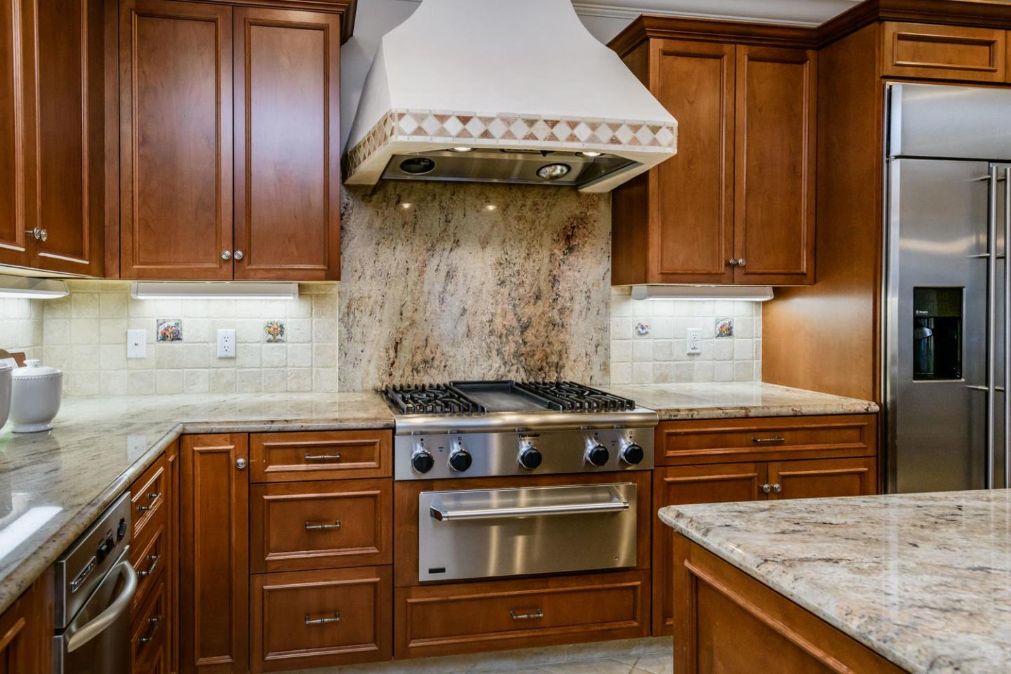 840 Newhall Road Burlingame, CA 94010 - Photo 14 of 41 a kitchen with a stove and a sink