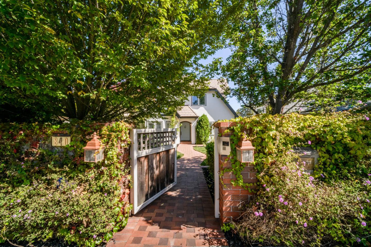 840 Newhall Road Burlingame, CA 94010 - Photo 2 of 41 a backyard of a house with lots of green space