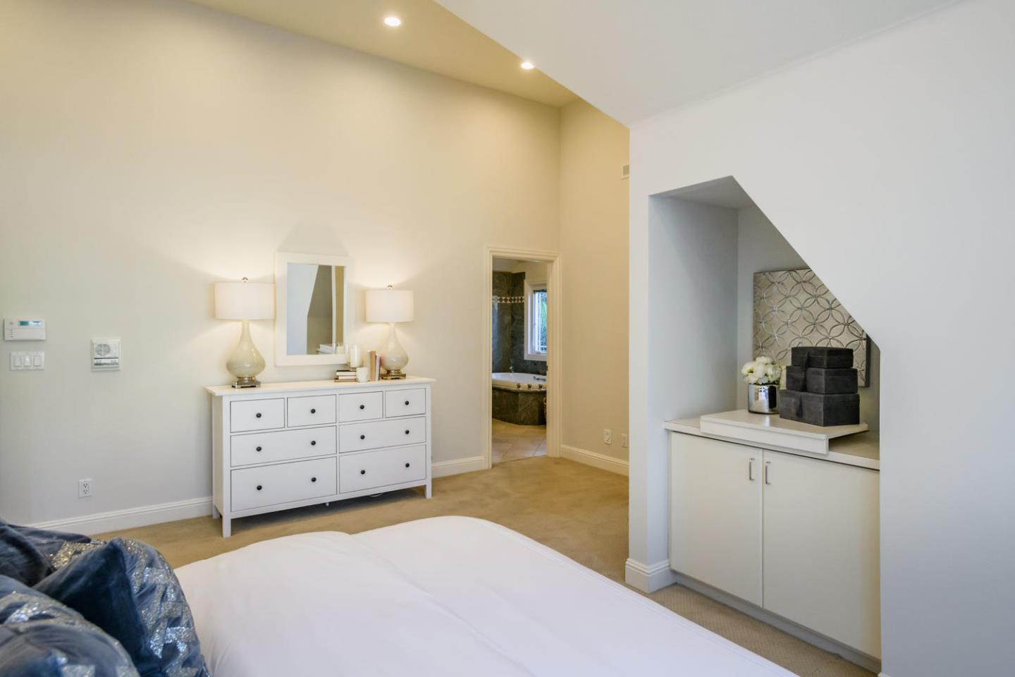 840 Newhall Road Burlingame, CA 94010 - Photo 25 of 41 a bedroom with a bed and a dresser in it