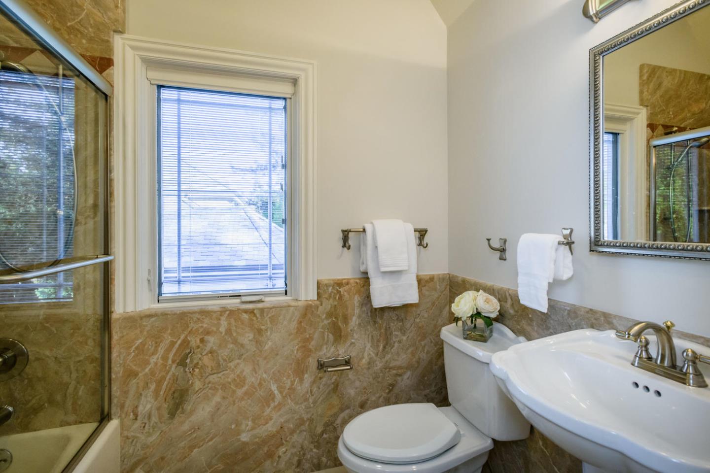 840 Newhall Road Burlingame, CA 94010 - Photo 33 of 41 a bathroom with a sink mirror and toilet