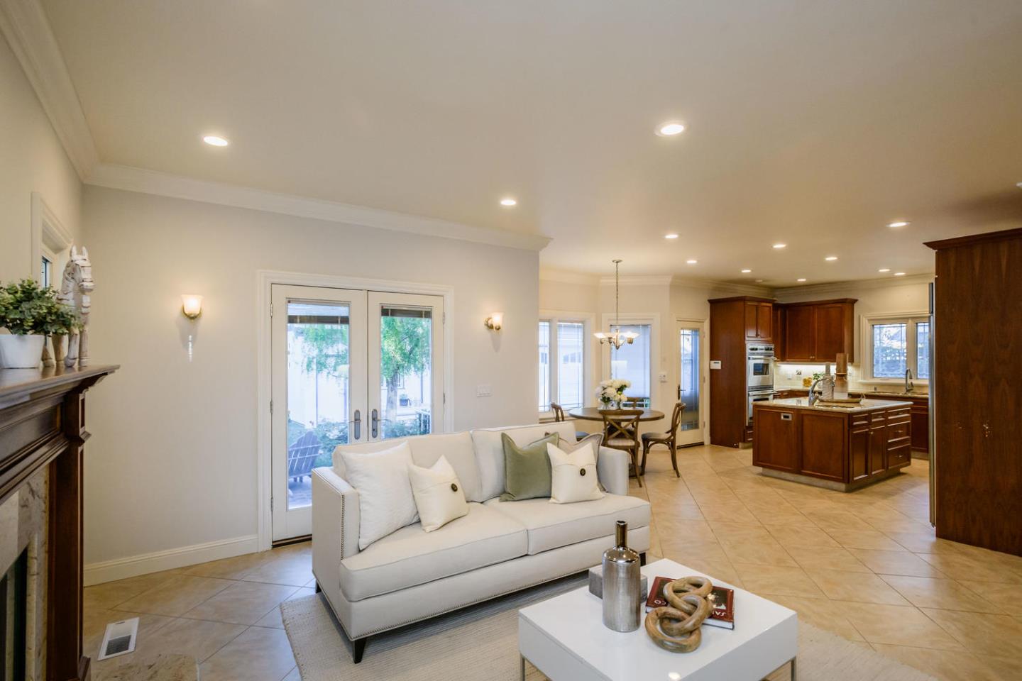 840 Newhall Road Burlingame, CA 94010 - Photo 10 of 41 a living room with furniture kitchen area and a window