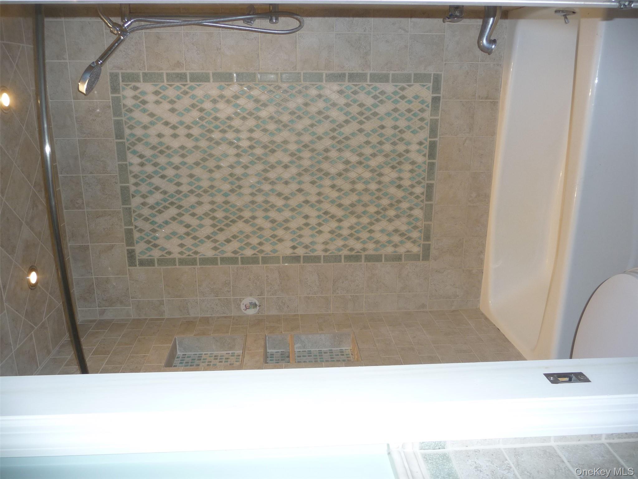 49 Lane Gate Road Wappingers Falls, NY 12590 - Photo 20 of 47 a bathroom with a bathtub and shower