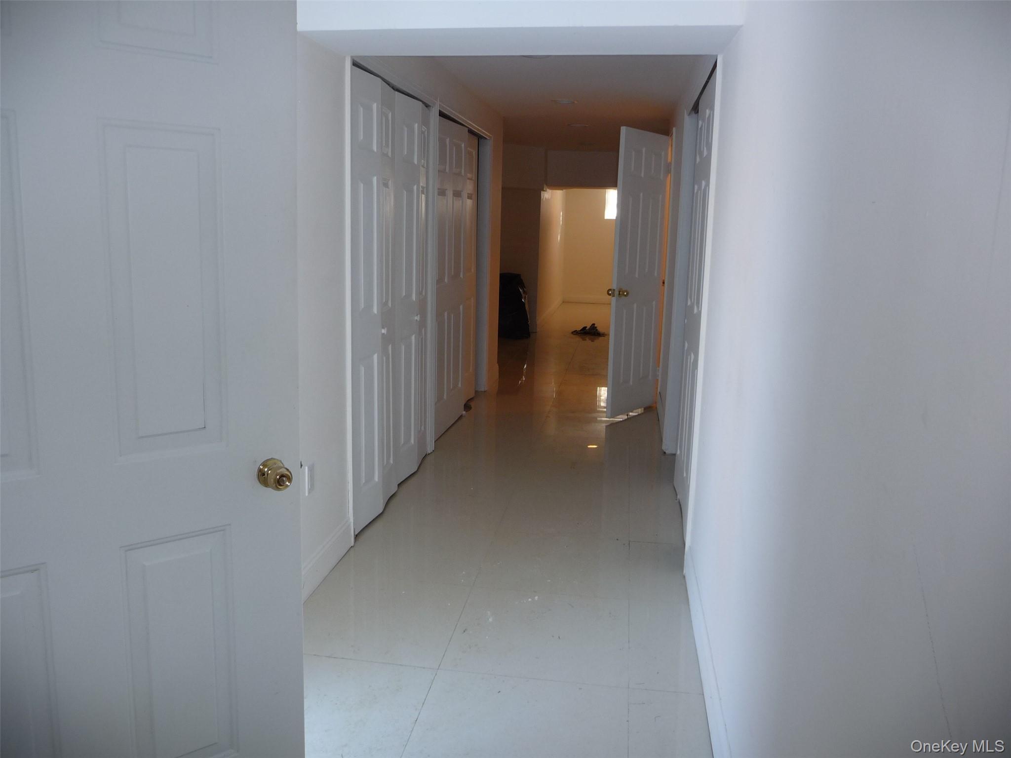 49 Lane Gate Road Wappingers Falls, NY 12590 - Photo 43 of 47 a view of a hallway with wooden shelves