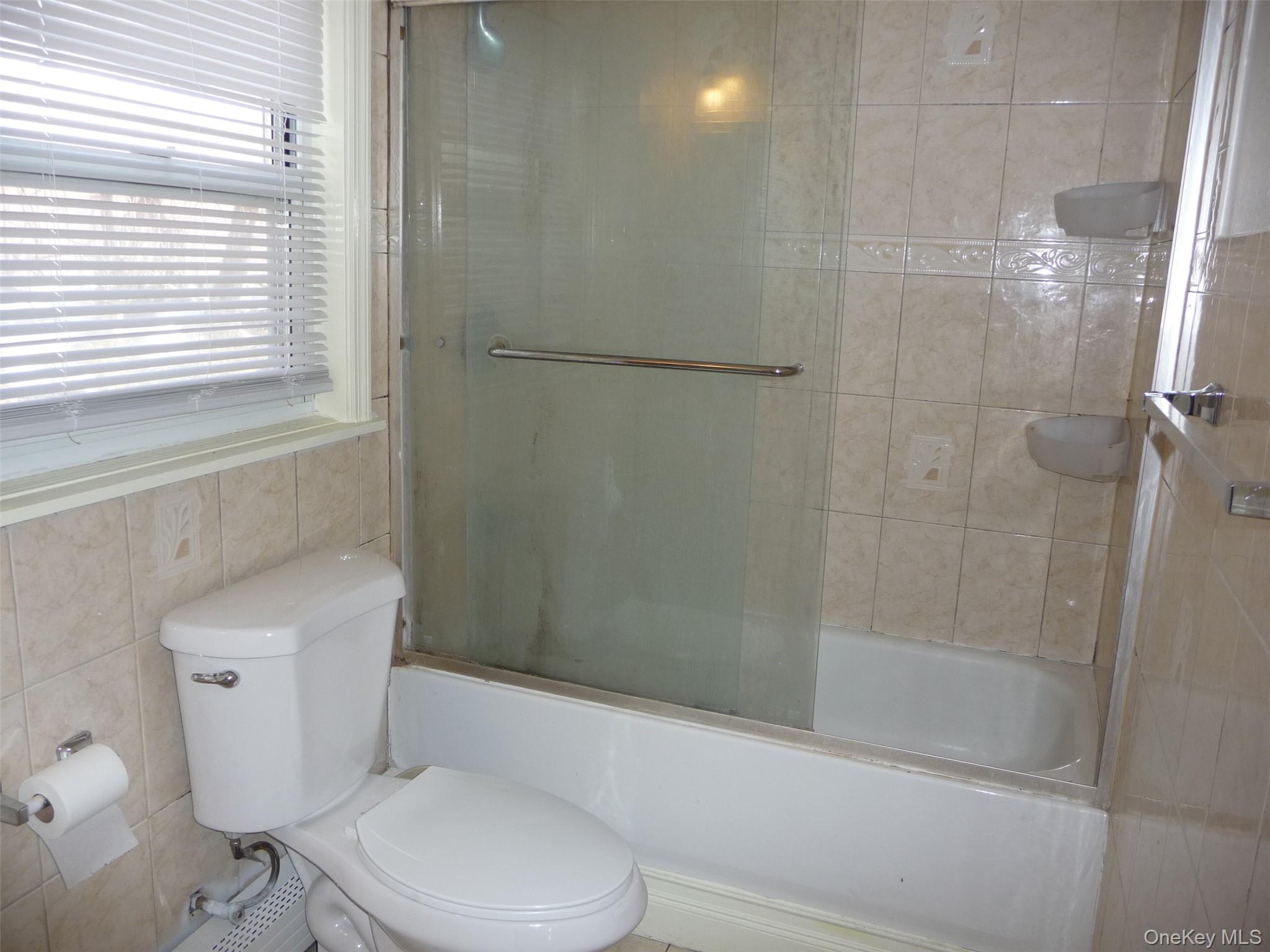 49 Lane Gate Road Wappingers Falls, NY 12590 - Photo 44 of 47 a bathroom with a toilet and a shower