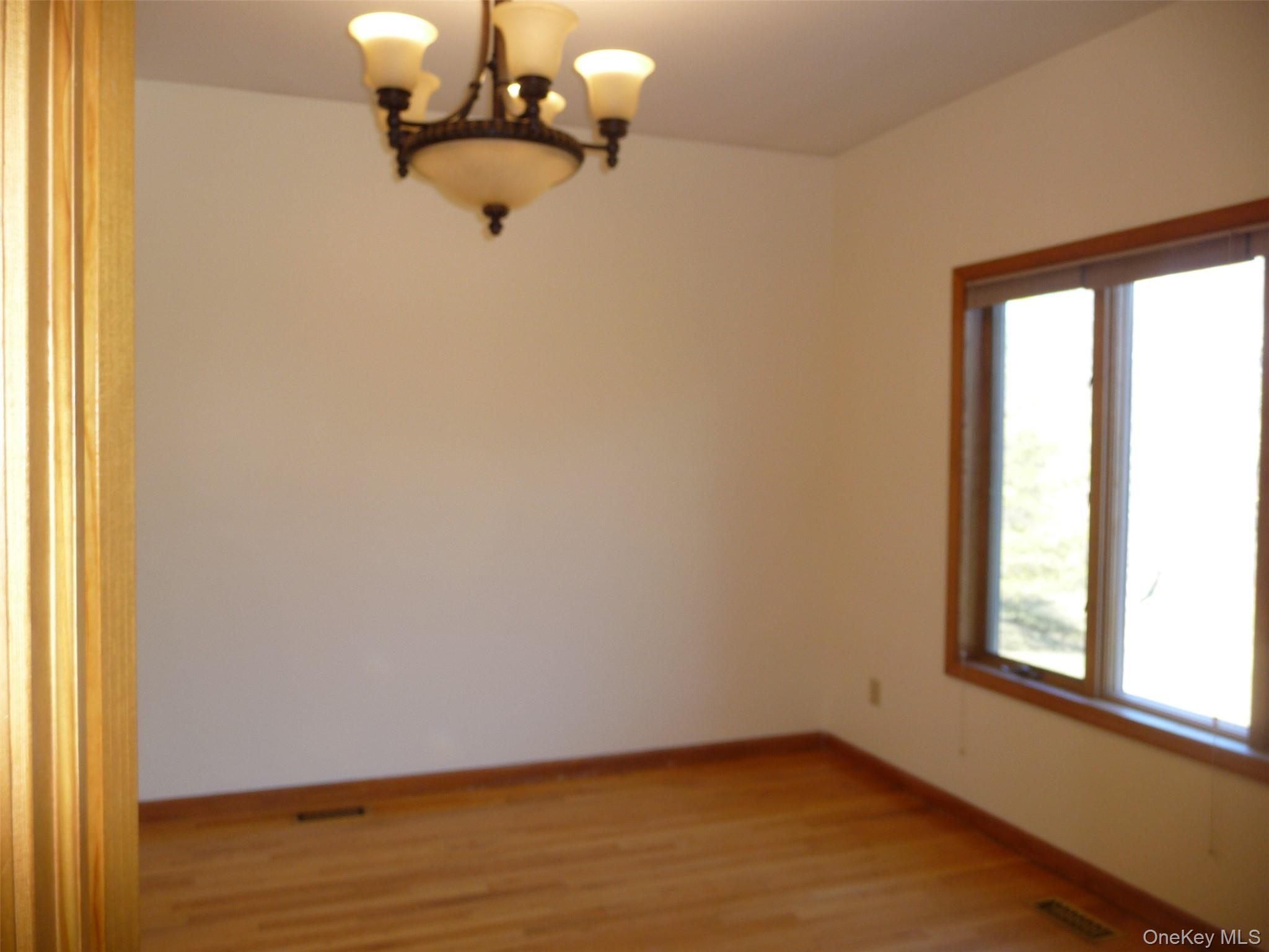 49 Lane Gate Road Wappingers Falls, NY 12590 - Photo 10 of 47 a view of an empty room with a window