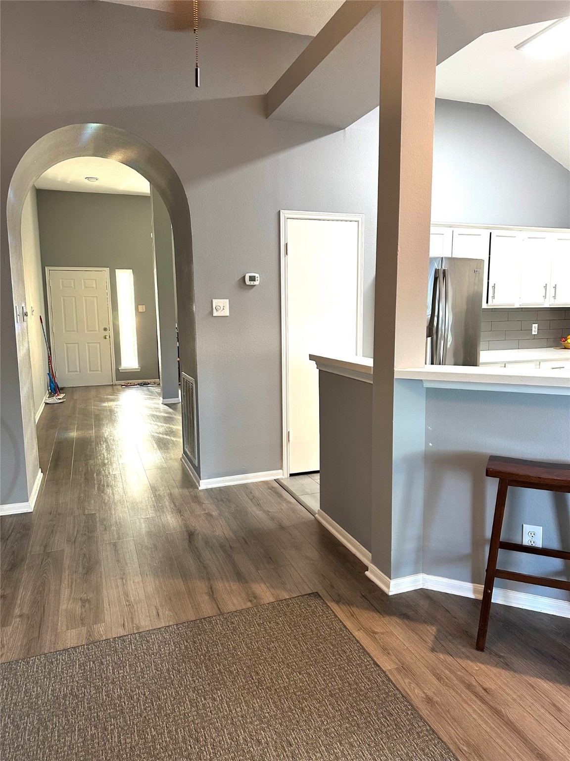 12922 Mills Bend Street Houston, TX 77070 - Photo 13 of 50 a view of a living room with wooden floor and a large window