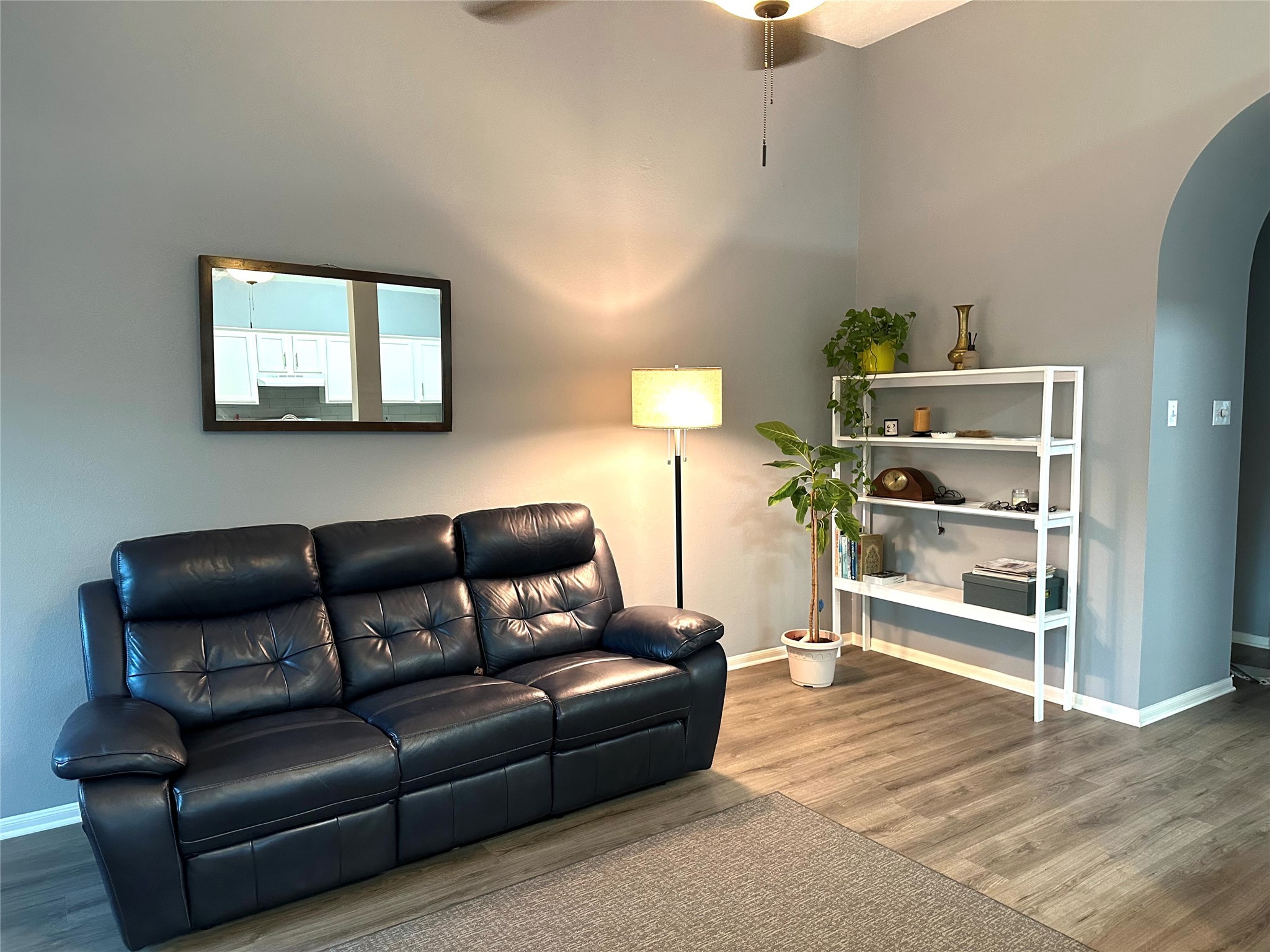 12922 Mills Bend Street Houston, TX 77070 - Photo 16 of 50 a living room with furniture and a flat screen tv