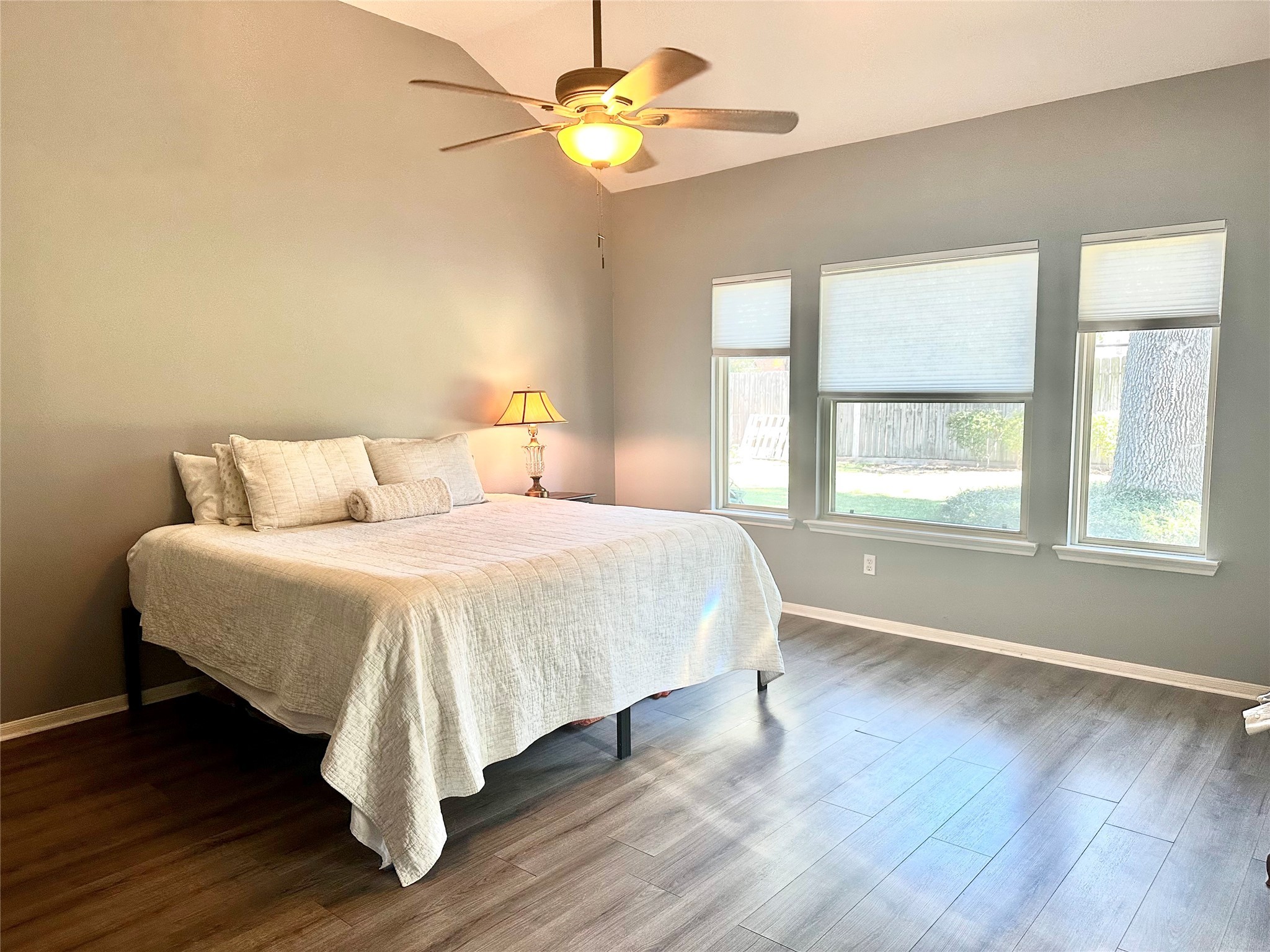 12922 Mills Bend Street Houston, TX 77070 - Photo 24 of 50 a bedroom with a bed and a window