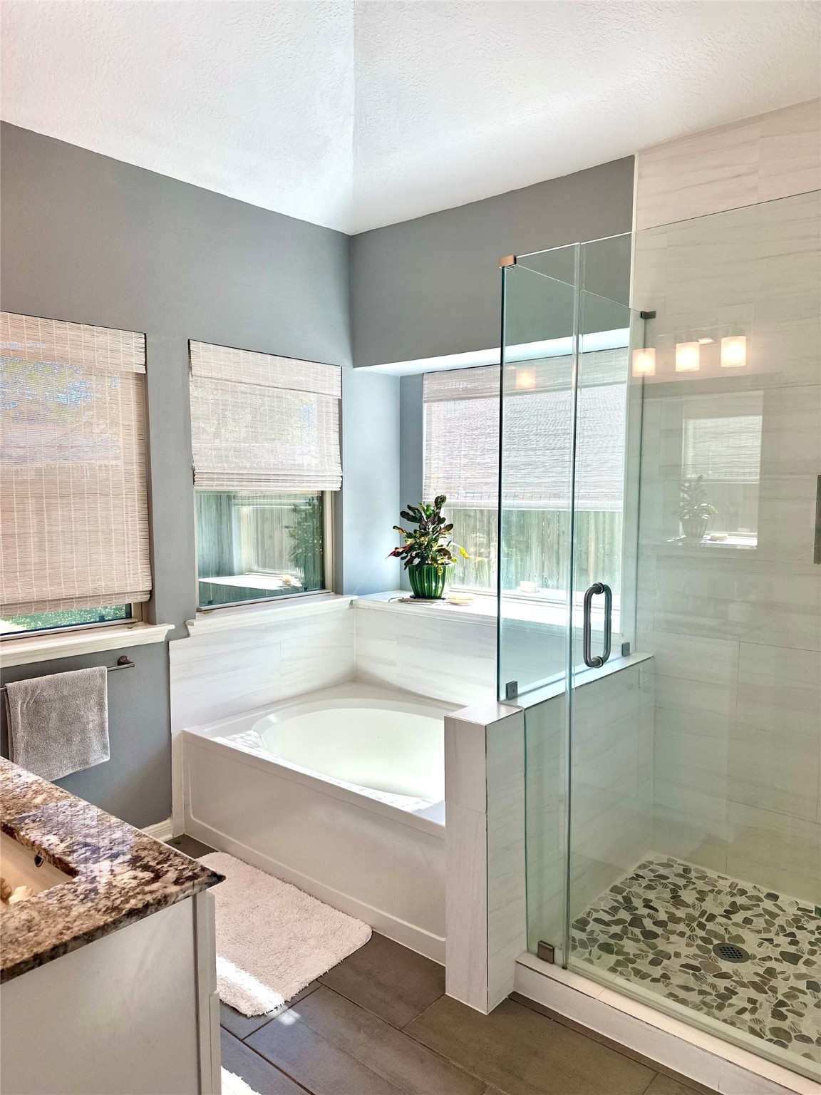 12922 Mills Bend Street Houston, TX 77070 - Photo 30 of 50 a spacious bathroom with a large tub and shower