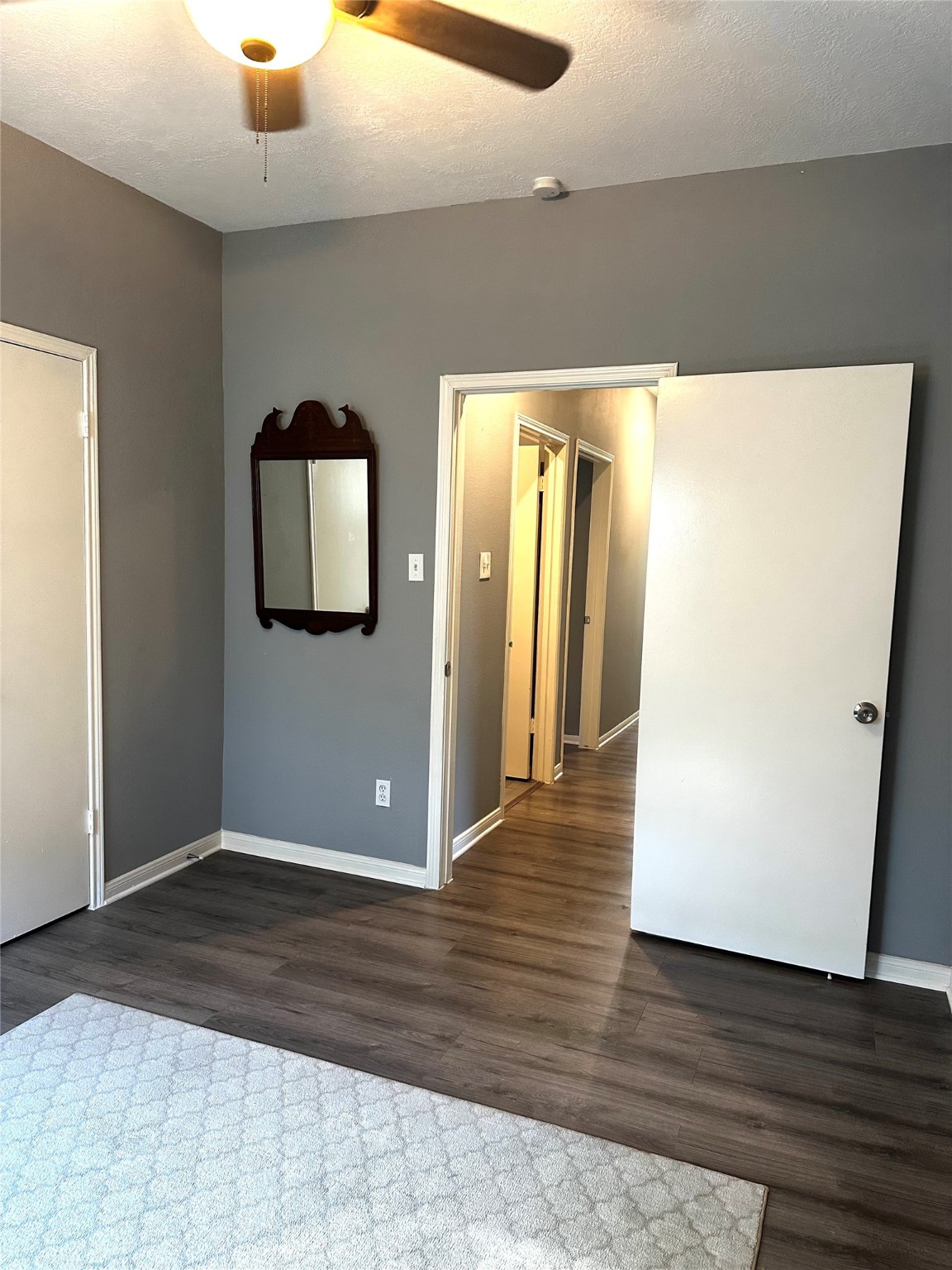 12922 Mills Bend Street Houston, TX 77070 - Photo 37 of 50 a view of a hallway with wooden floor