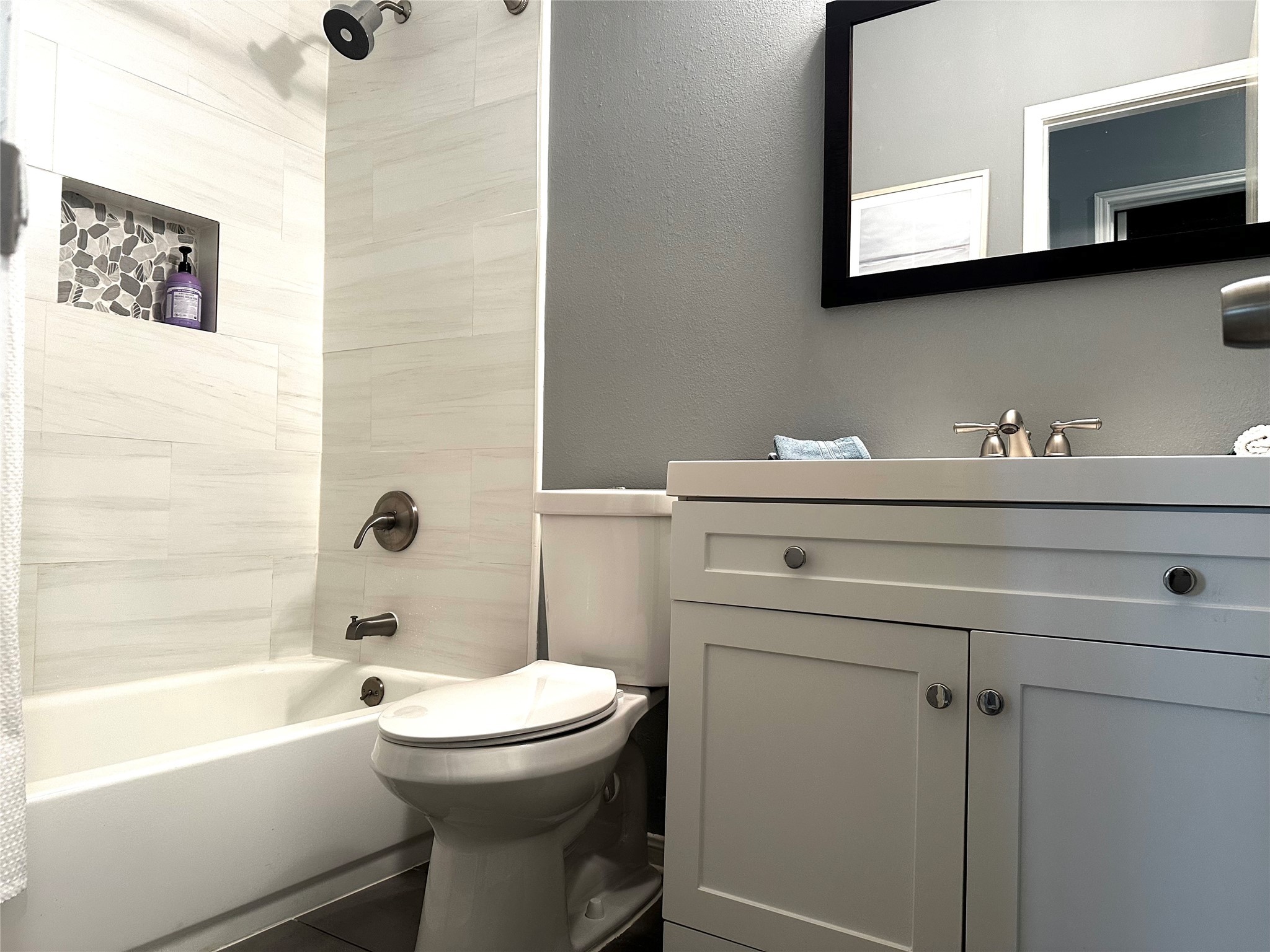 12922 Mills Bend Street Houston, TX 77070 - Photo 40 of 50 a bathroom with a sink a toilet and shower