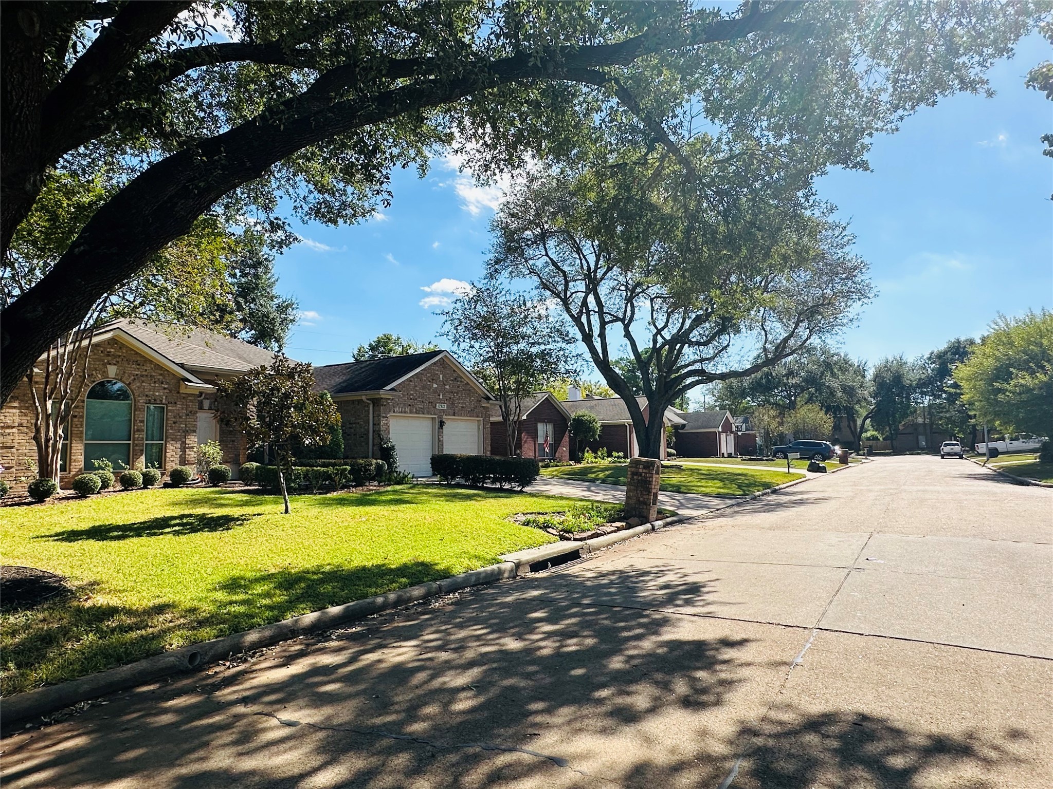 12922 Mills Bend Street Houston, TX 77070 - Photo 43 of 50 a view of a house with swimming pool and a yard