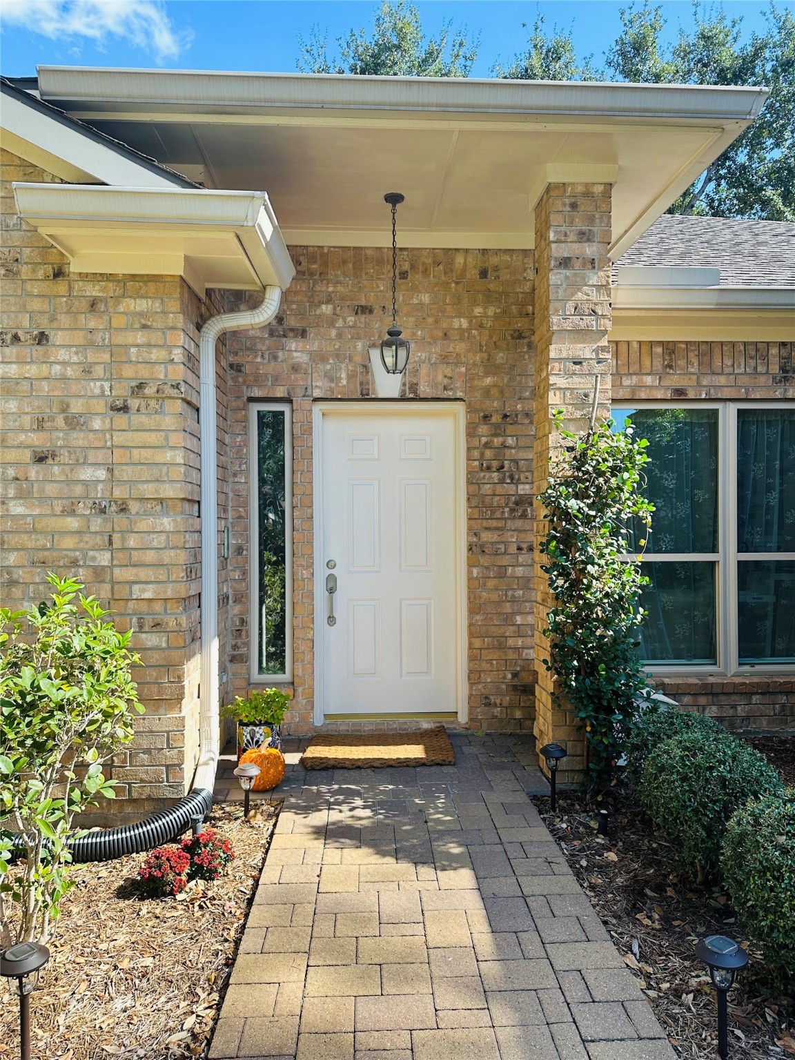 12922 Mills Bend Street Houston, TX 77070 - Photo 5 of 50 a front view of a house with a yard