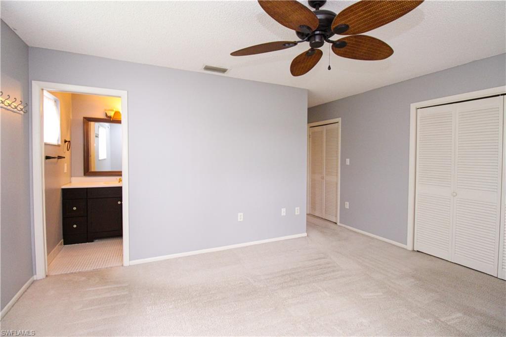 729 Palm View Drive, Unit D4 Naples, FL 34110 - Photo 15 of 23 a view of an empty room and window