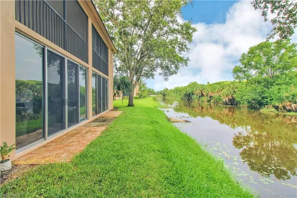 a view of backyard with green space