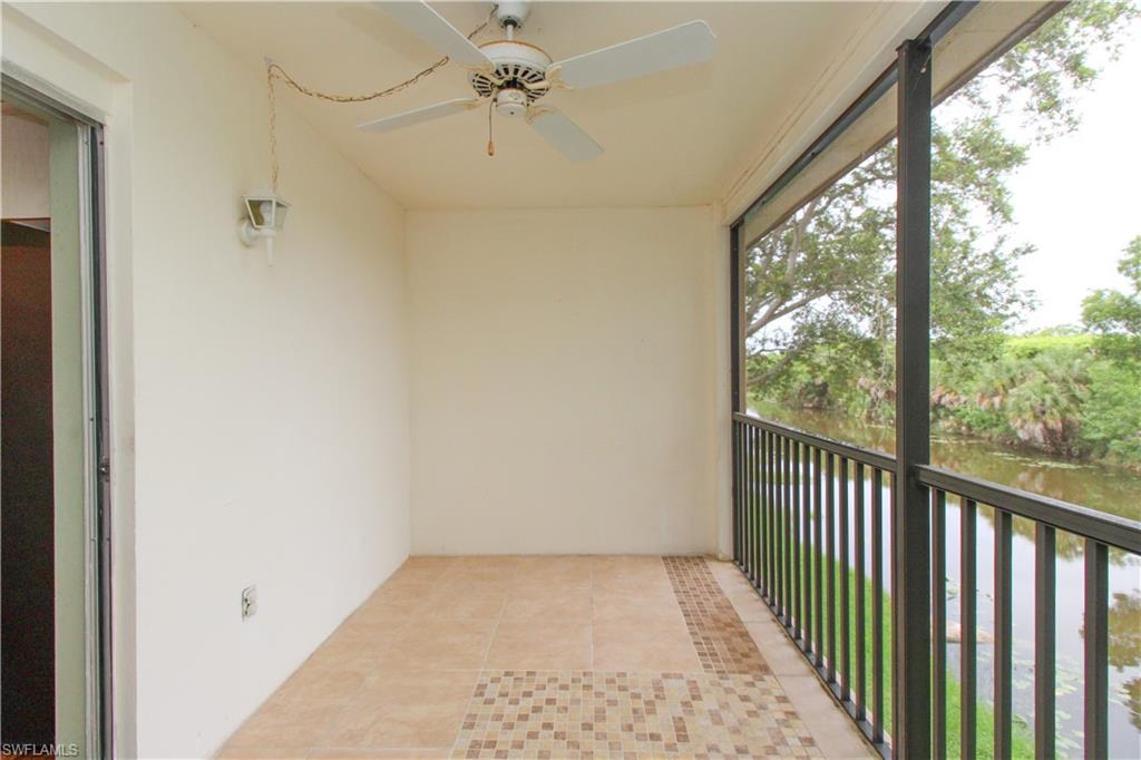 729 Palm View Drive, Unit D4 Naples, FL 34110 - Photo 7 of 23 a view of a hallway with a window