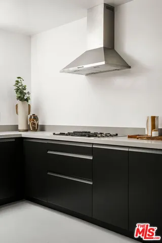 a close view of sink and cabinets