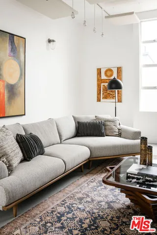 a living room with furniture and a couch