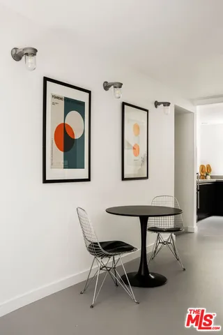 a view of a livingroom with furniture and window