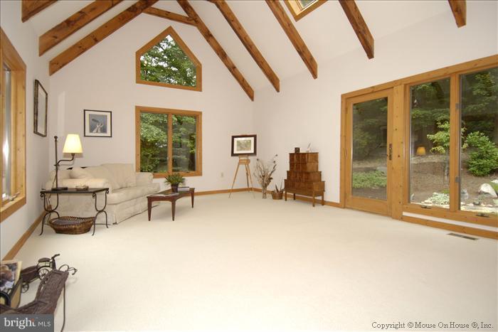 5536 Etzler Road Frederick, MD 21702 - Photo 22 of 30 a living room with furniture and a large window