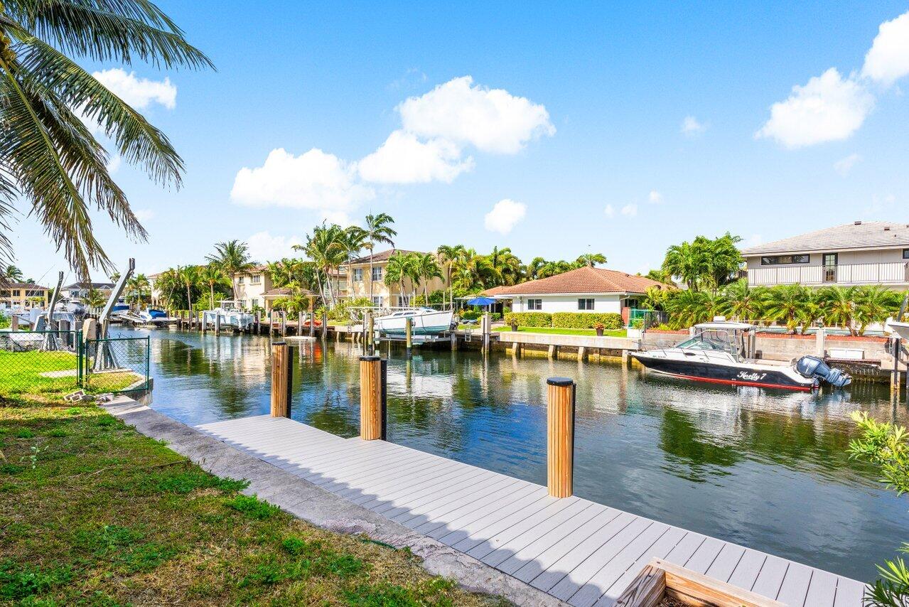 3163 Northeast 8th Avenue Boca Raton, FL 33431 - Photo 3 of 31 a lake view with a lake view