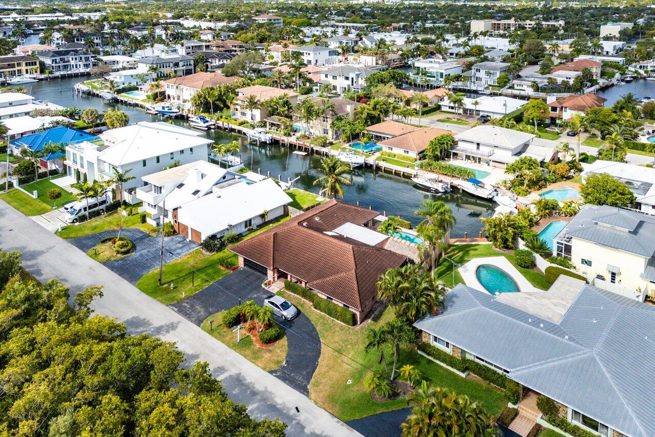 3163 Northeast 8th Avenue Boca Raton, FL 33431 - Photo 31 of 31 an aerial view of residential houses with outdoor space