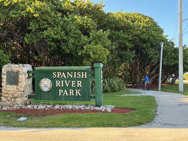 3163 Northeast 8th Avenue Boca Raton, FL 33431 - Photo 32 of 35 a sign on the side of a road