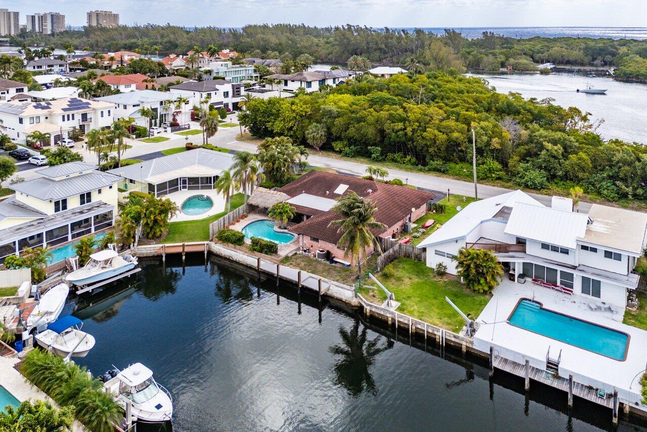 3163 Northeast 8th Avenue Boca Raton, FL 33431 - Photo 5 of 31 an aerial view of a swimming pool with lawn chairs