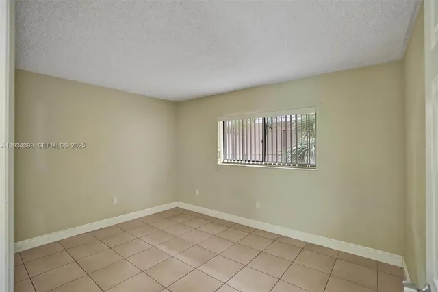 a view of a room with windows