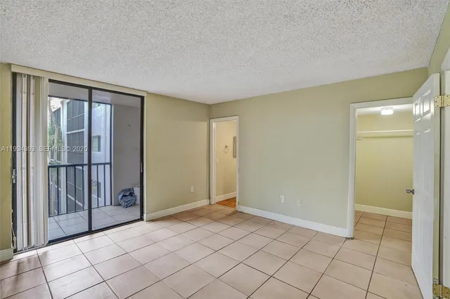 a view of an empty room with window