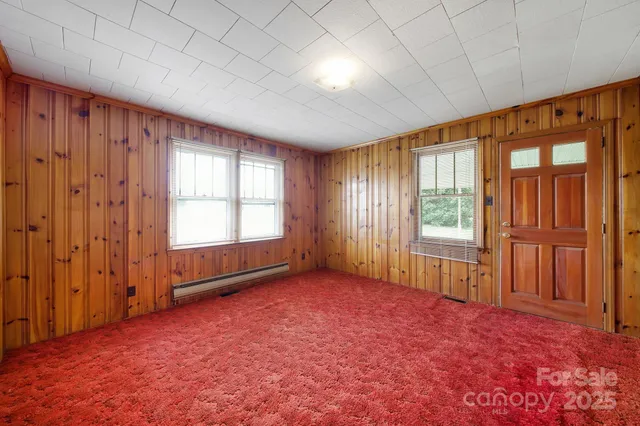 an empty room with windows