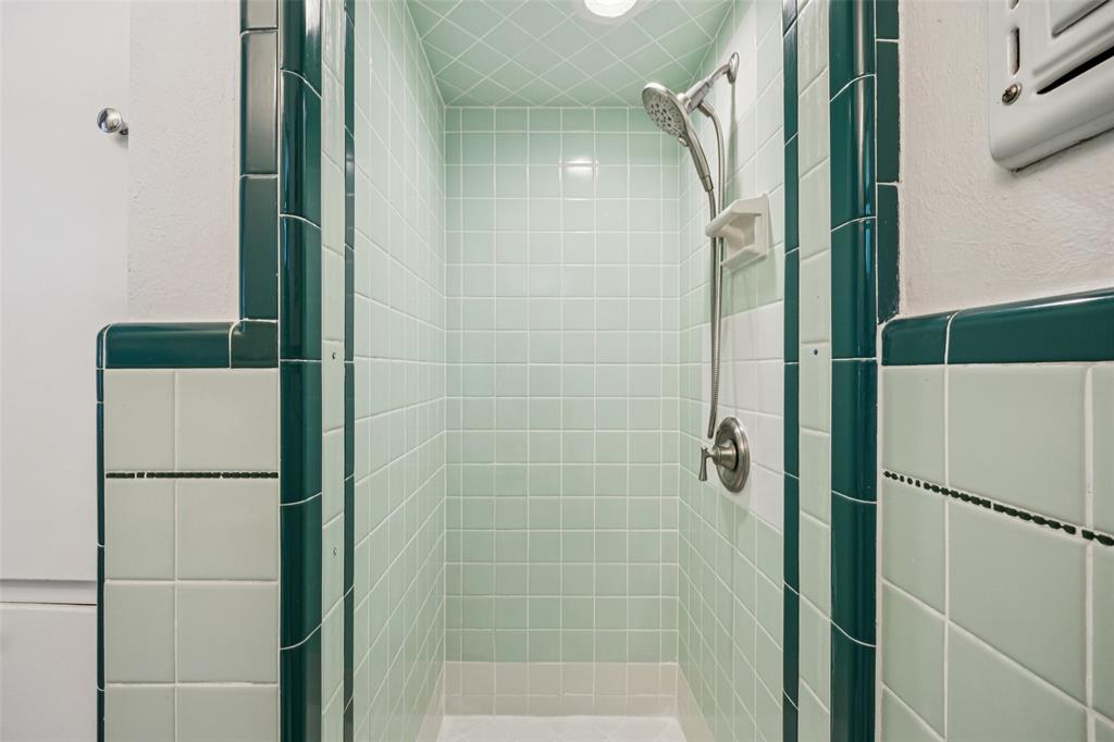601 Ridgedale Drive Richardson, TX 75080 - Photo 18 of 26 a bathroom with a shower