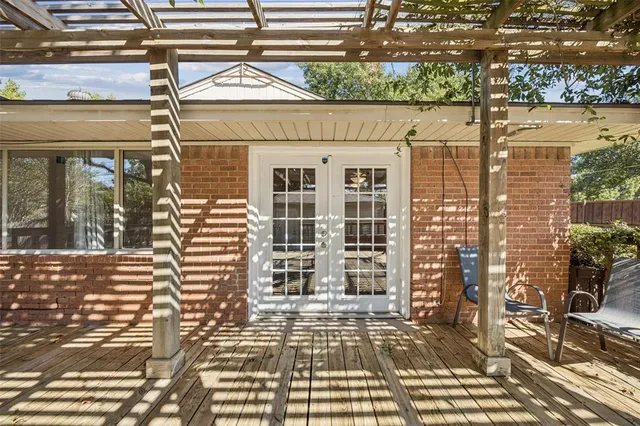 a view of a brick building with many windows