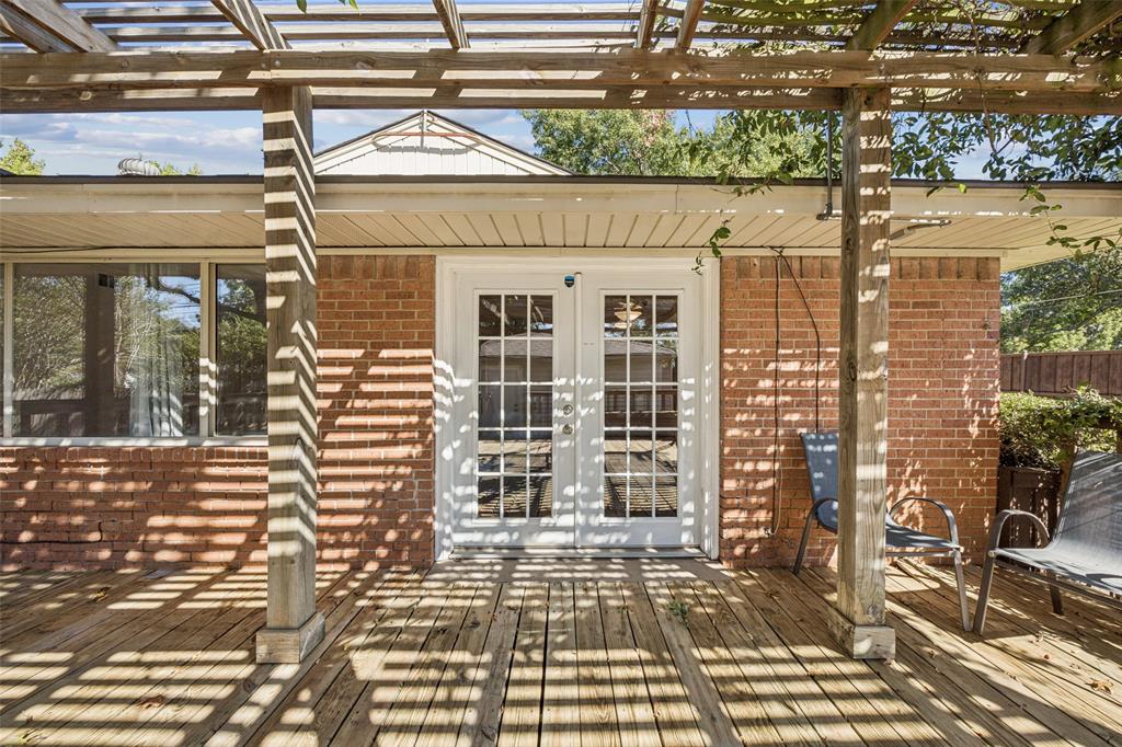 601 Ridgedale Drive Richardson, TX 75080 - Photo 21 of 26 a view of a brick building with many windows