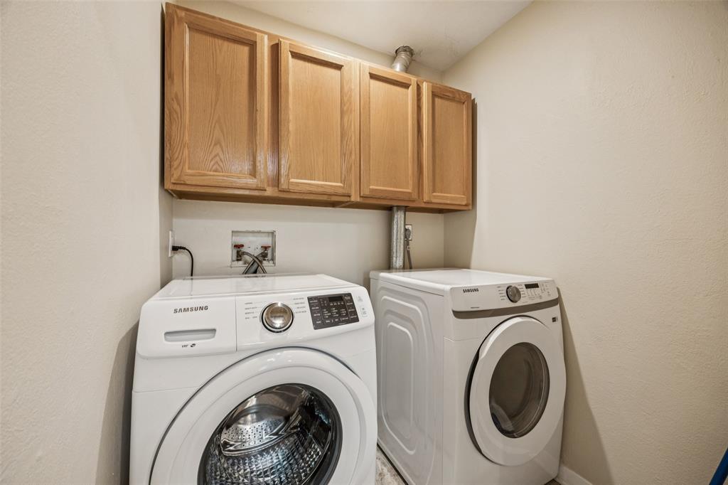 601 Ridgedale Drive Richardson, TX 75080 - Photo 10 of 26 a utility room with dryer and washer