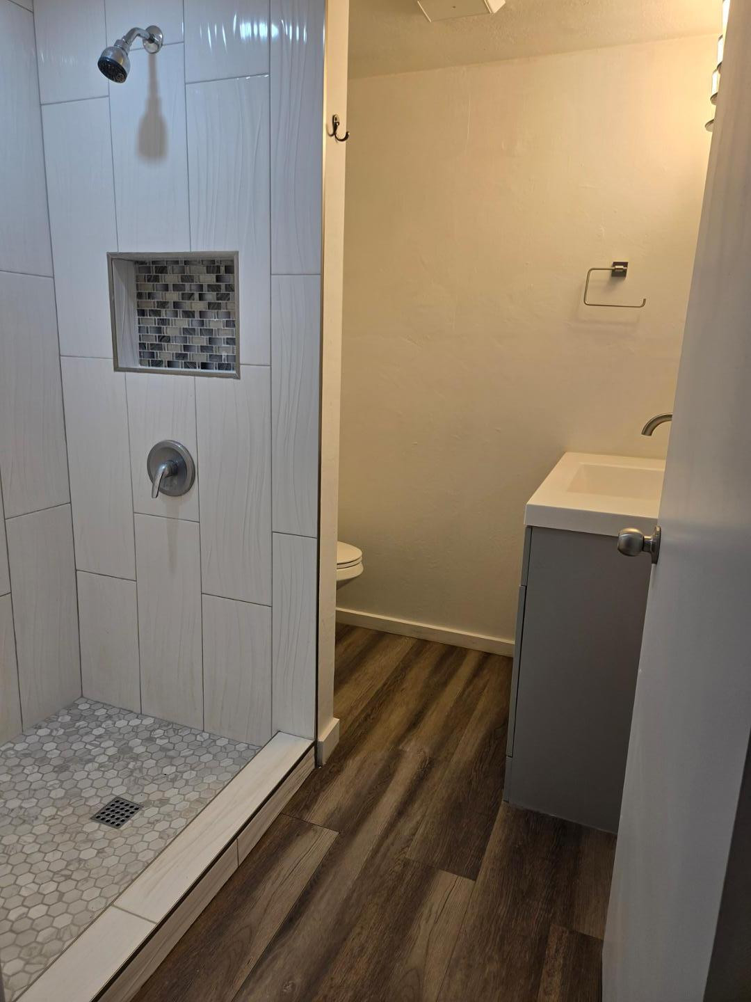 620 East Broadway Lane Tempe, AZ 85282 - Photo 13 of 15 a bathroom with a sink and a shower