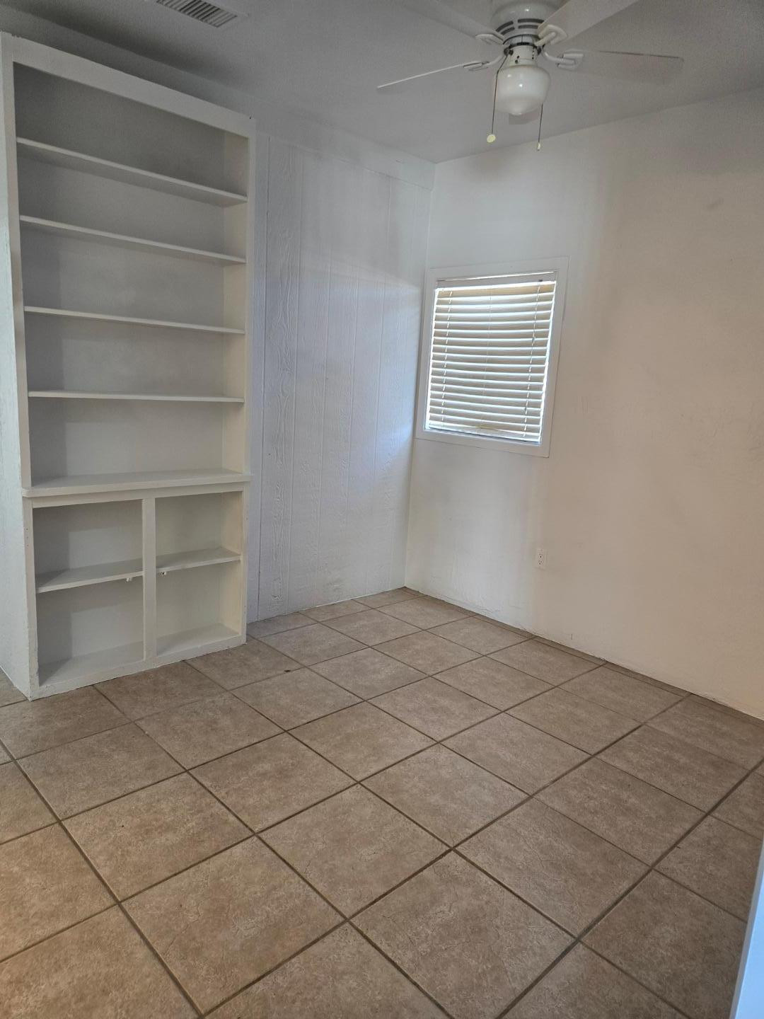 620 East Broadway Lane Tempe, AZ 85282 - Photo 15 of 15 a view of a room with racks on the wall