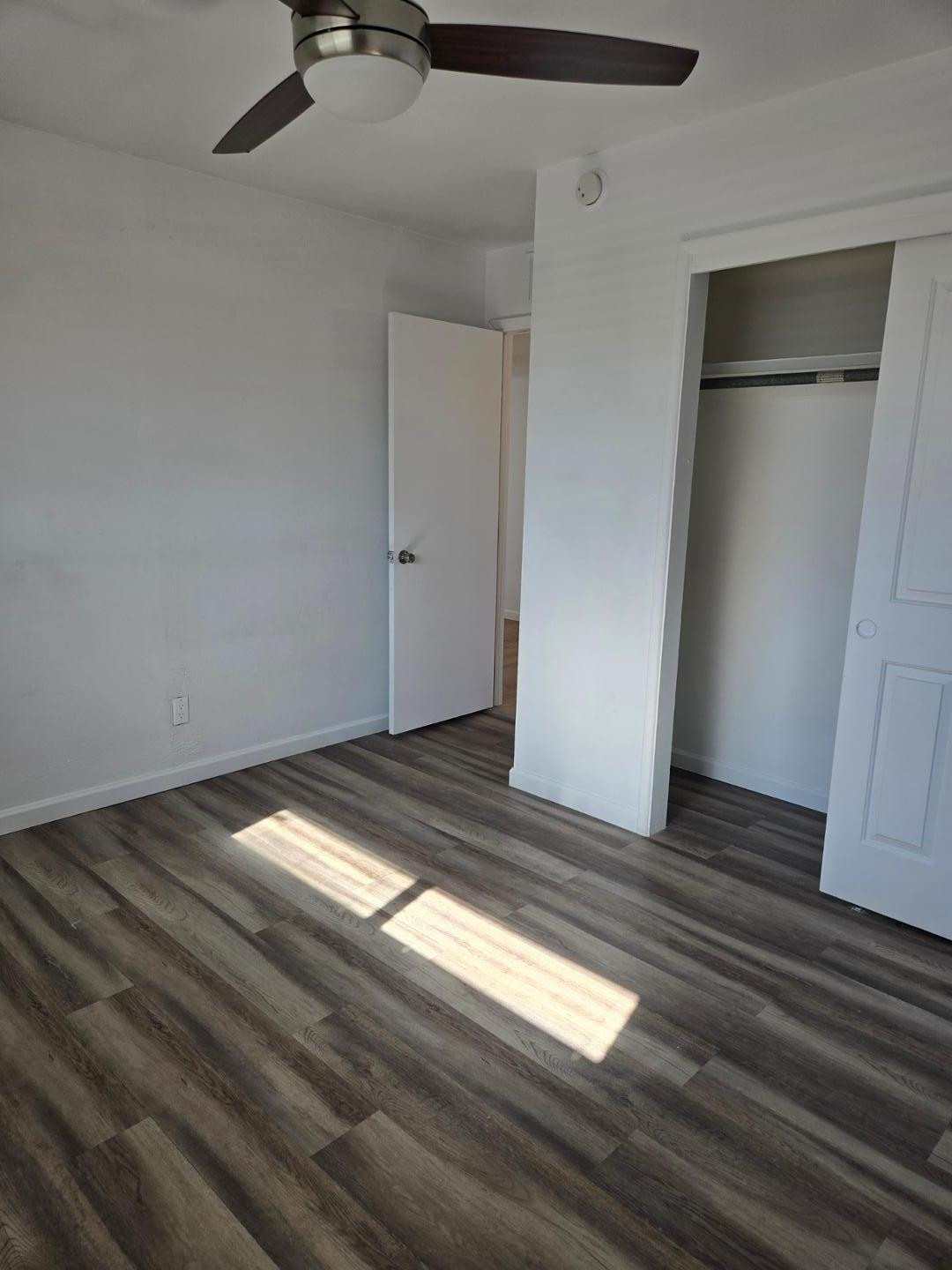 620 East Broadway Lane Tempe, AZ 85282 - Photo 8 of 15 a view of empty room with wooden floor