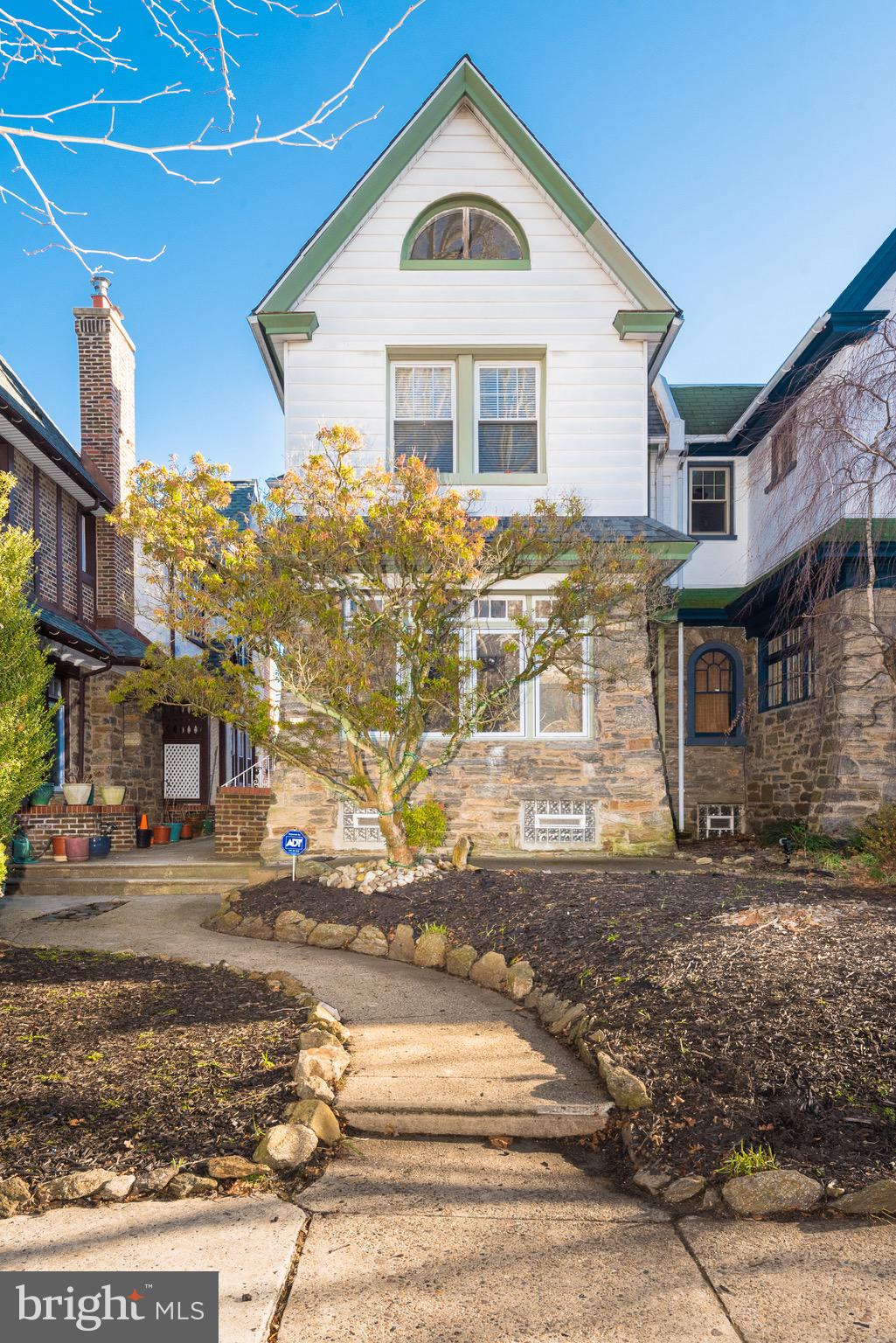 426 Glen Echo Road Philadelphia, PA 19119 - Photo 2 of 77 a front view of a house with a yard