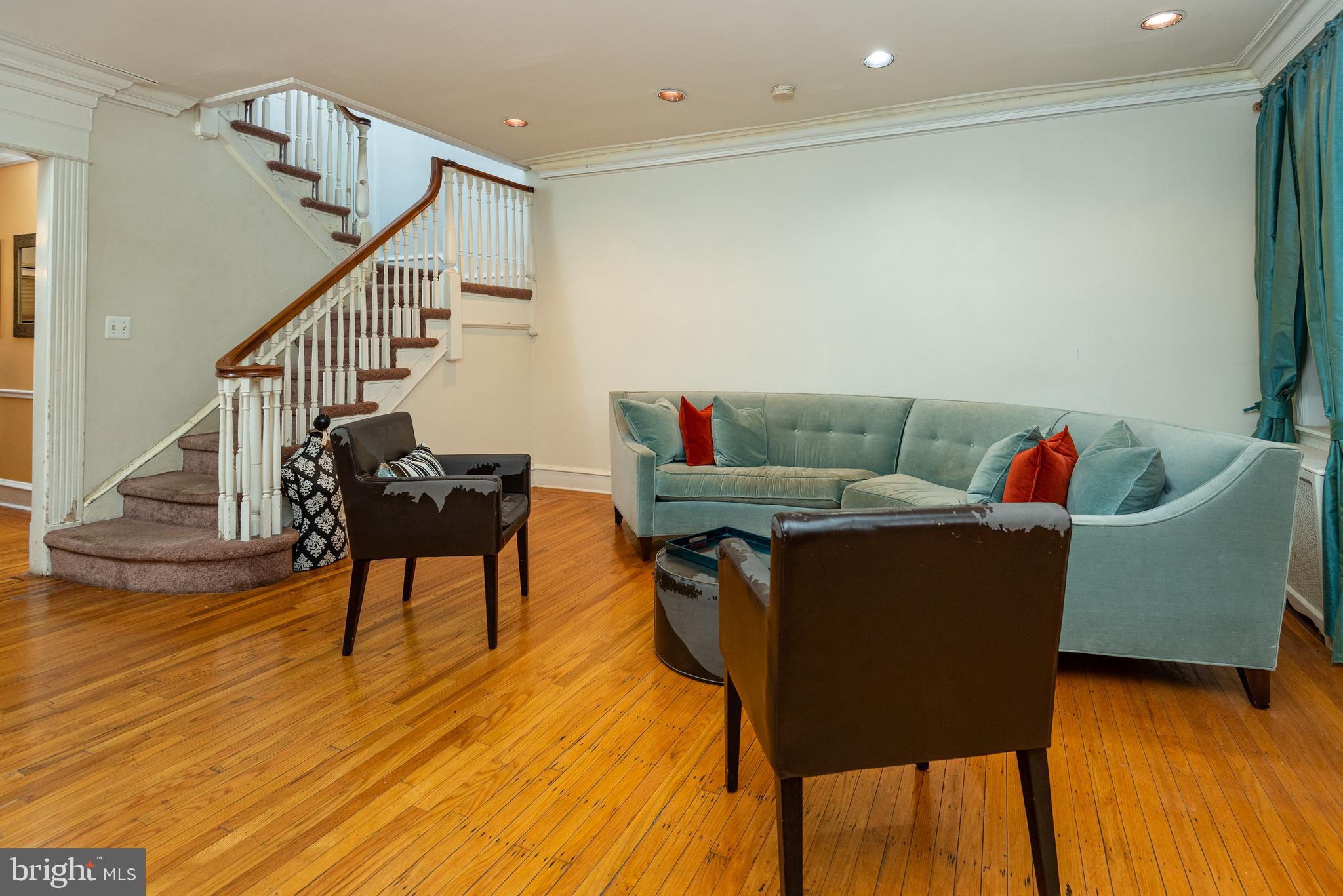 426 Glen Echo Road Philadelphia, PA 19119 - Photo 14 of 77 a living room with furniture and a wooden floor