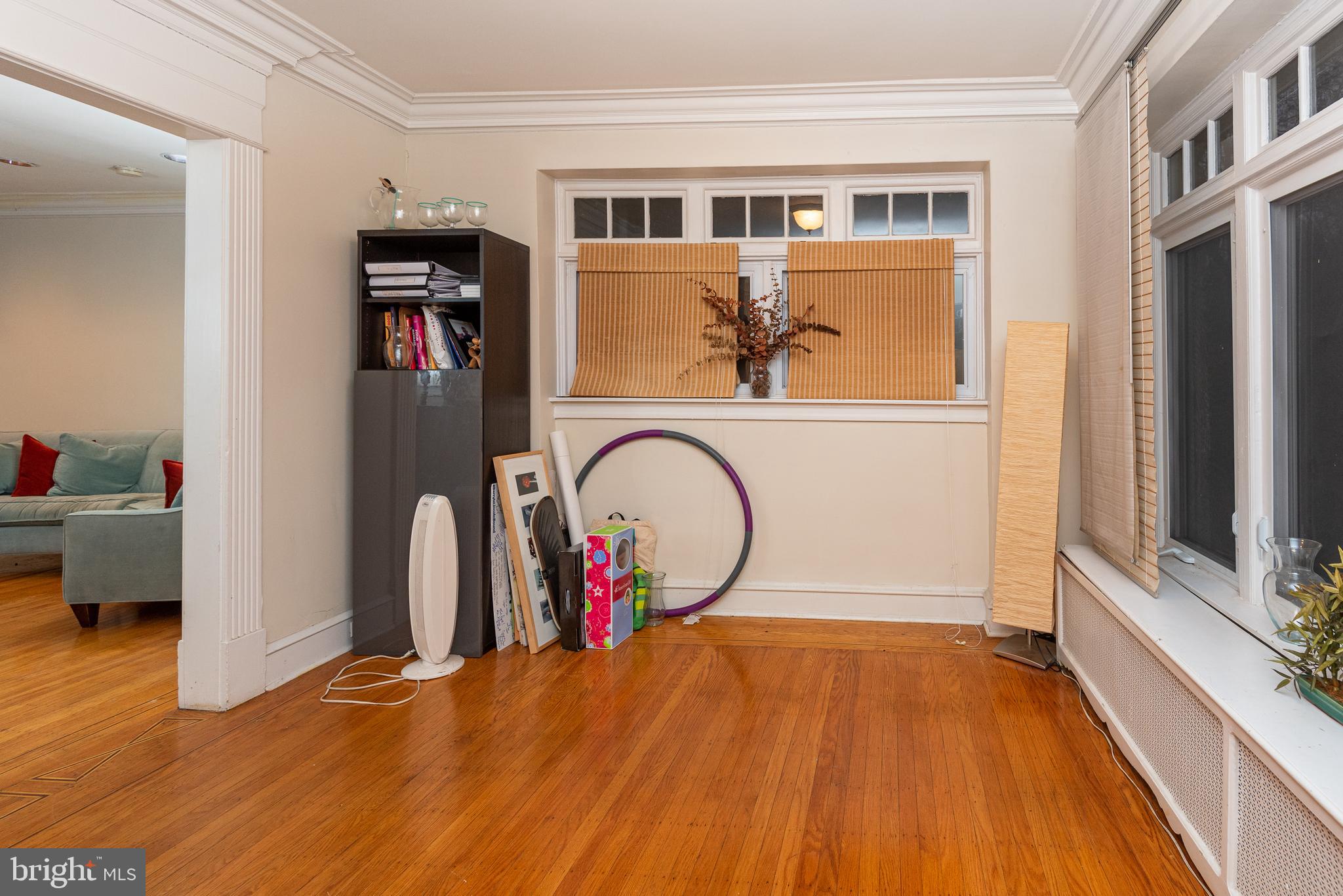 426 Glen Echo Road Philadelphia, PA 19119 - Photo 21 of 77 a view of a hallway with wooden floor and furniture