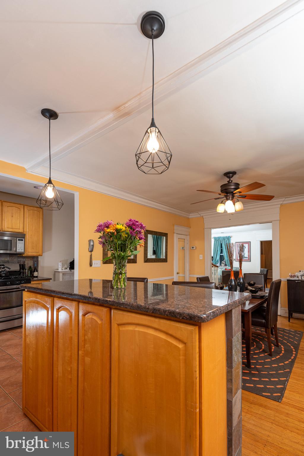 426 Glen Echo Road Philadelphia, PA 19119 - Photo 28 of 77 a kitchen with stainless steel appliances granite countertop a stove refrigerator and cabinets