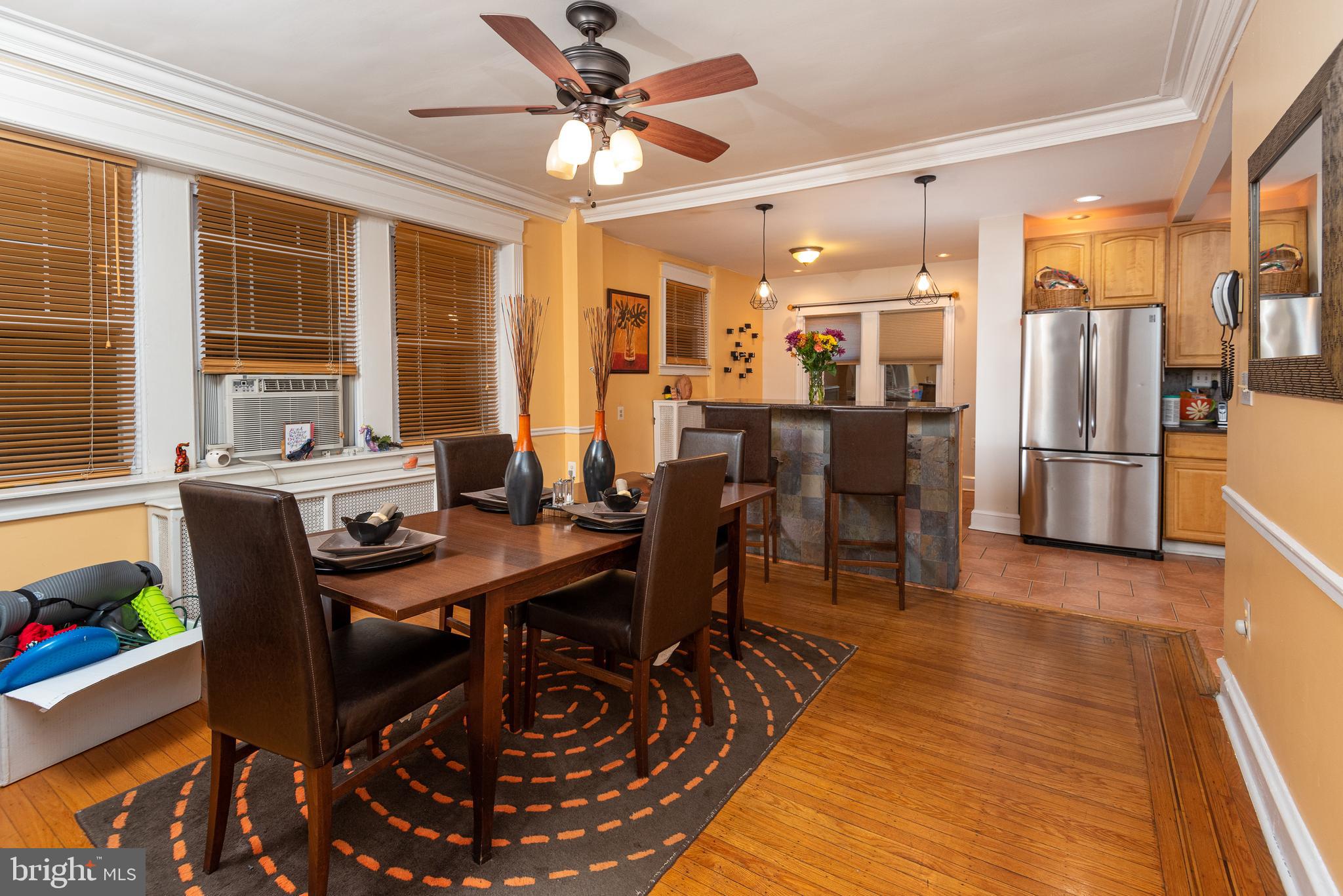 426 Glen Echo Road Philadelphia, PA 19119 - Photo 29 of 77 a view of a dining room with furniture window and wooden floor